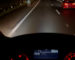 WATCH: Truck Driver “Shares” Headlights With Biker Riding in the Dark